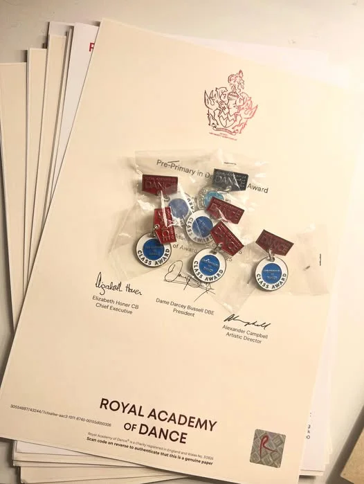 Royal Academy of Dance certificates and class award medals